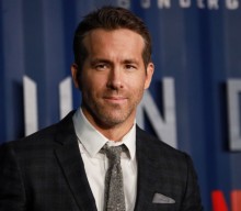 Ryan Reynolds wears face mask and Deadpool costume in COVID plea to “save lives”