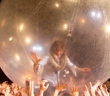 The Flaming Lips perform ‘Race for the Prize’ inside giant bubbles on ‘Colbert’