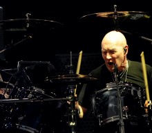 Chris Slade says he still believes that he is AC/DC’s drummer