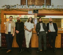 Watch IDLES get socially distanced on raucous new video for ‘Carcinogenic’