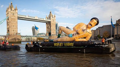 A 40-foot inflatable Borat statue floated down the River Thames today
