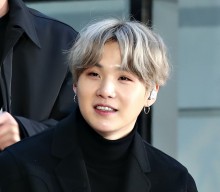 BTS’ Suga confirmed to sit out “most” upcoming promotional activities following surgery