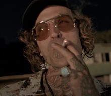 Watch Yelawolf’s new video for ‘Country Rich’ featuring Three 6 Mafia’s DJ Paul