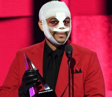 Here’s why The Weeknd was covered in bandages at the AMAs