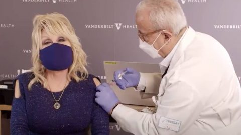 Dolly Parton receives the COVID-19 vaccine that she helped fund