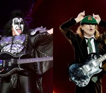 KISS’ Gene Simmons on first meeting AC/DC’s Angus Young: “He didn’t have front teeth”