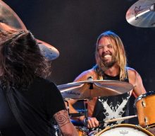 Watch Taylor Hawkins on lead vocals in Foo Fighters’ disco cover ‘Shadow Dancing’