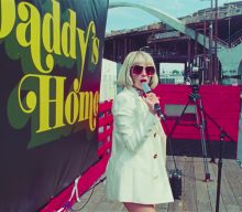 St. Vincent is a one-woman street parade in new ‘Daddy’s Home’ video