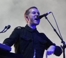 Massive Attack call on government to cut carbon emissions at concerts