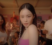 Follow Lee Hi on a trip back to the ’90s in her music video for ‘Red Lipstick’