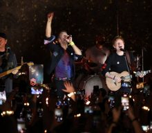 Watch Ed Sheeran join Coldplay for performance of ‘Fix You’ at album launch gig