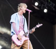 Machine Gun Kelly teases new ‘Mainstream Sellout’ music and unveils new guitar