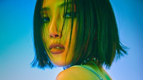 Hwasa reveals her first full-length solo album is “slightly on hold”