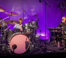 Watch Nandi Bushell enter a drum battle with Queen’s Roger Taylor
