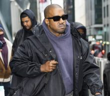 Kanye West lets fan freestyle for him in the street in New York City