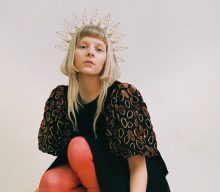 Listen to AURORA’s punchy new single ‘The Woman I Am’