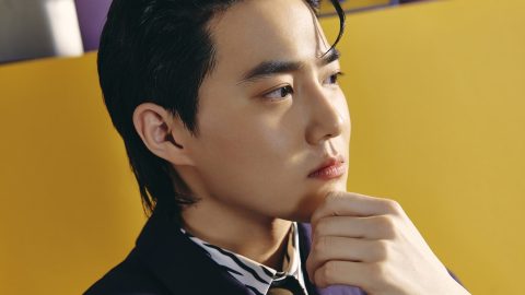 EXO’s Suho freezes time in cinematic ‘Grey Suit’ music video