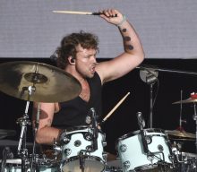 5 Seconds Of Summer’s Ashton Irwin “recovering very well” after passing out on-stage