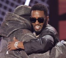 Kanye West makes surprise appearance at BET Awards to present Diddy with Lifetime Achievement Award