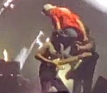 Watch: RAGE AGAINST THE MACHINE’s TOM MORELLO Gets Accidentally Knocked Off Stage By Security In Toronto
