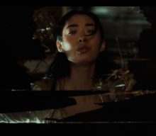 Watch Rina Sawayama break free from 19th century time loop in ‘Hold The Girl’ video