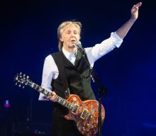 Watch Paul McCartney almost get run over while recreating iconic Beatles album cover
