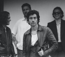 Alex Turner says he was “pretty happy” with the reaction to Arctic Monkeys’ ‘Tranquility Base Hotel & Casino’