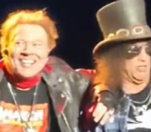 Watch: SLASH Accidentally Bumps Into AXL ROSE During GUNS N’ ROSES Concert In Brazil