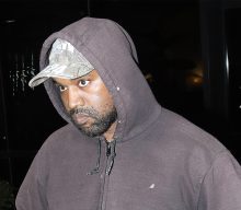 Kanye West walks out of interview after being challenged over antisemitic views