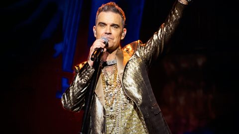 Robbie Williams reiterates desire to play Glastonbury’s legends slot: “I know I’d slaughter it”