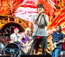 Watch Red Hot Chili Peppers give Eddie Van Halen tribute song live debut