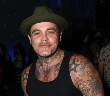 Crazy Town hit out at “fucking poor excuse of a drummer” ex-bandmate