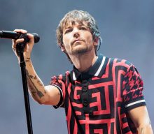 Louis Tomlinson cancels in-store signings after breaking his arm
